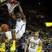 Michigan freshman Glenn Robinson III dunks in the first half of the game against Illinois on Sunday, Feb. 24. Daniel Brenner I AnnArbor.com